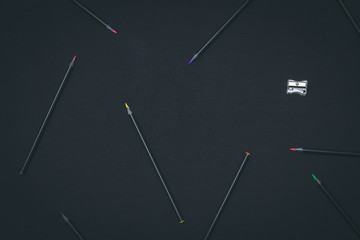 black color pencils on black background