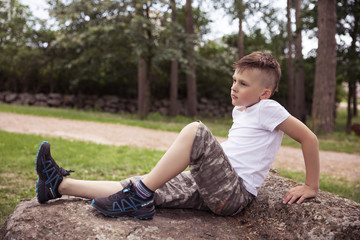 Young photo model posing, boy fashion portrait