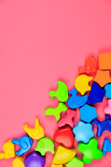 Colorful celebration background with plastic toys.