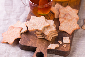 Star shaped ginger cookies stack tied with ribbon