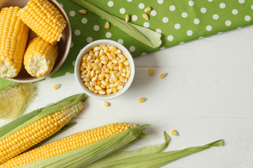 Fresh corn on a light background. Corn heads.