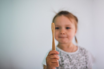 Cute little girl brushing his teeth. Oral hygiene.