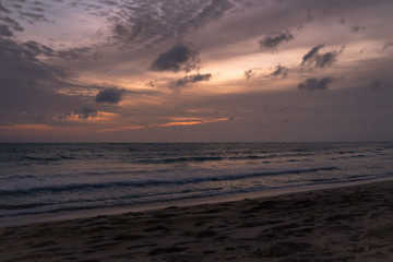 Orange sunset sky with cloud tropical area at Phuket Thailand.