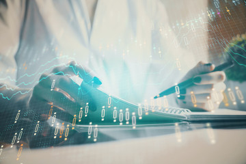 Financial chart drawn over hands taking notes background. Concept of research. Multi exposure