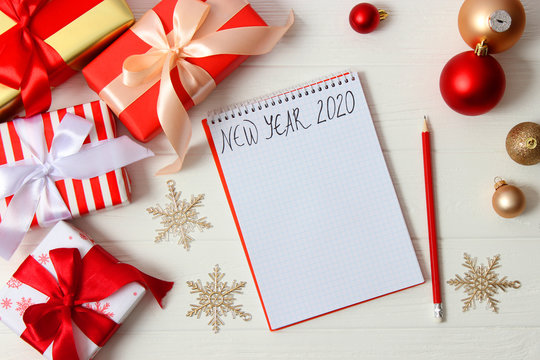 notebook with a wish list on a colored background, flat style. Planning concept.