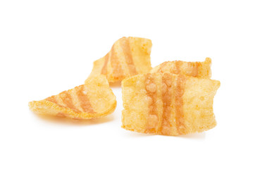 Fried wheat-potato snack with smoked bacon flavor isolated on white background