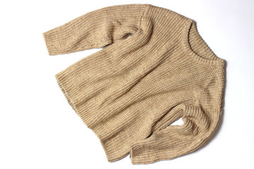 Sweater on a white background top view.