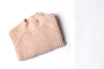 Sweater on a white background top view.