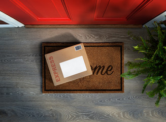 Express parcel delivery outside front door. Overhead view. Add your own copy