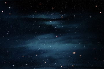 Stars in the Night Sky With Cloudy Nebula