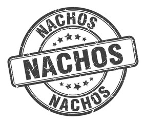 nachos stamp. nachos round grunge sign. nachos