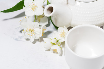 white pialat, tea and jasmine. japanese tea party, top view