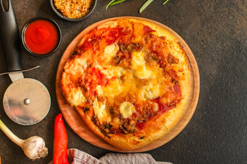 pizza with different types of cheese (tomato sauce and other ingredients, snack). top food background. copy space