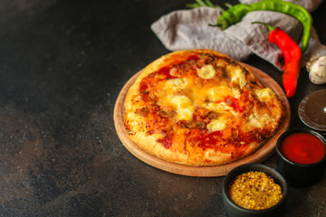 pizza with different types of cheese (tomato sauce and other ingredients, snack). top food background. copy space