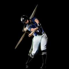 one caucasian baseball player man studio shot isolated on black background with light painting...
