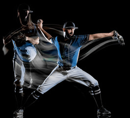 one caucasian baseball player man studio shot isolated on black background with light painting...
