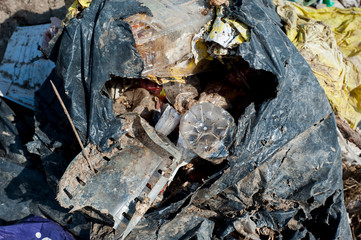 Scum on the city landfill. Waste for recycling