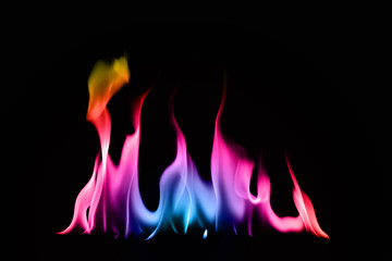 Rainbow fire and flame on black background.