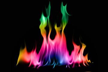 Rainbow fire and flame on black background.