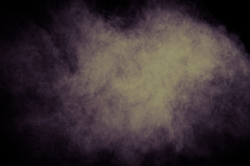 White powder explosion on black background. Colored cloud. Colorful dust explode. Paint Holi.