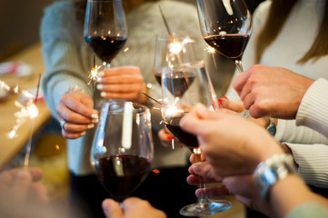 Friends celebrate their birthday at the local winery. Elegant glasses with homemade quality wine