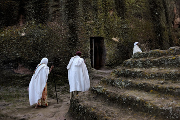 Pilgrims at at monolithic rock-hewn church, Lalibela, Ethiopia. UNESCO World Heritage site.