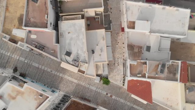 Typical Greek Housing in Small Coastal Cities. Aerial Top Bird Eye View of House Rooftops by Aegean Sea