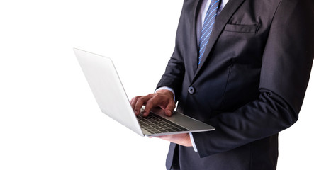 Businessman typing on laptop keyboard