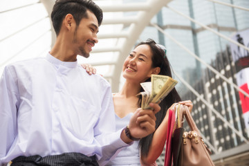 Myanmar couple shopping in city