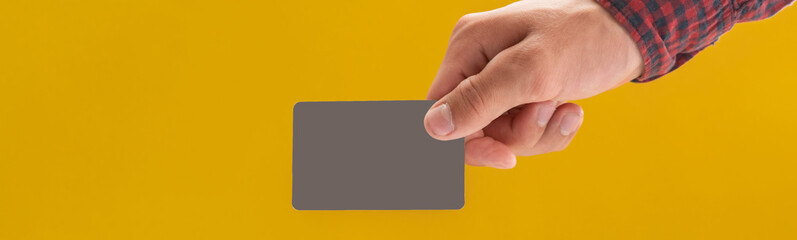 hand holdng a visit card with copy space mockup
