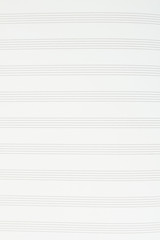 Musical notes paper background. Music notation paper sheet, vertical image. Sheet music for musical...