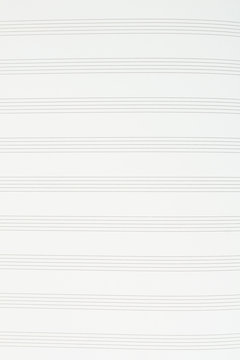 Musical notes paper background. Music notation paper sheet, vertical image. Sheet music for musical notes background.
