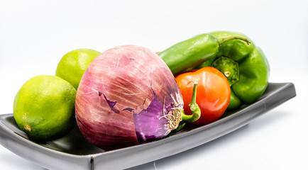 Colourful ingredients for pico de gallo on boards and in bowls. Calgary, alberta, Canada