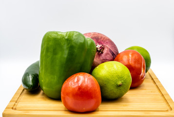 Colourful ingredients for pico de gallo on boards and in bowls. Calgary, alberta, Canada