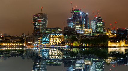 Fototapeta na wymiar London skyline with its famous skyscrapers at night