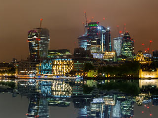 Fototapeta premium London skyline with its famous skyscrapers at night