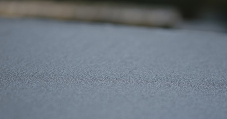 sanded gray terrazzo concrete surface