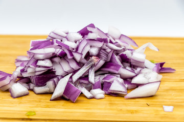 Red onions on a wooden cutting board. Calgary, alberta Canada