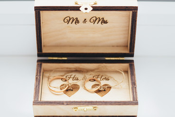 wedding gold rings in a box. wedding ceremony gathering bride and groom.