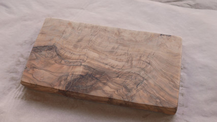 Fototapeta na wymiar olive wood board from above