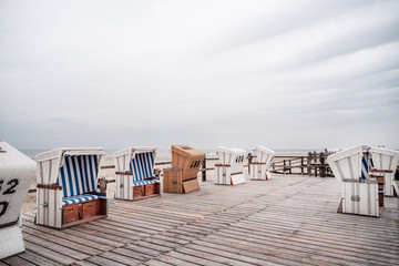 Fototapeta na wymiar chairs on the beach
