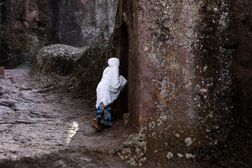 Pilgrims at at monolithic rock-hewn church, Lalibela, Ethiopia. UNESCO World Heritage site.