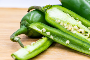 Jalapeno peppers on a wooden cutting board. Calgary, Alberta, Canada