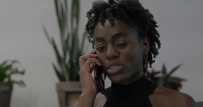 Black Woman Talking on Phone