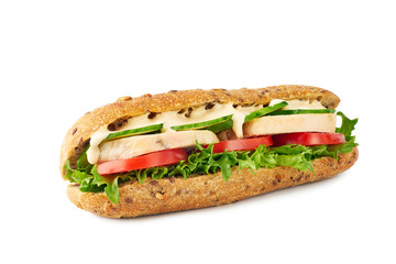 Whole grain sandwich with chicken and vegetables on white