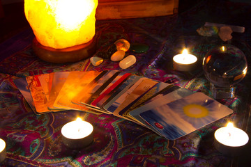Tarot deck on a table with lights