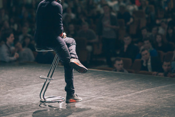 business coach delivers a report to the audience in the conference room