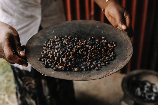 Traditional Ethiopian coffee beans roasting, Roasted coffee bean pile