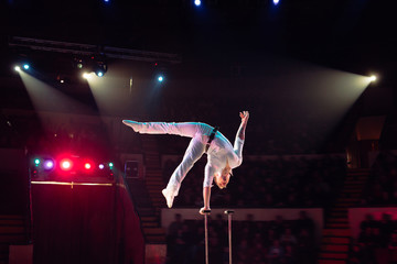 Man's aerial acrobatics in the Circus.