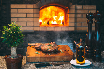 Cooking Steak in a stone oven